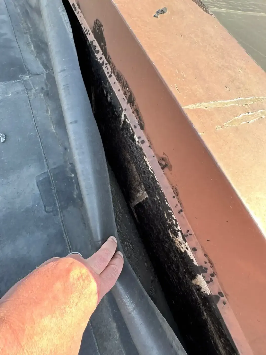 Tarping and dry-in on a Rensselaer commercial roof